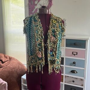 Artsy boho fringe multicolored whimsical floral pattern vest